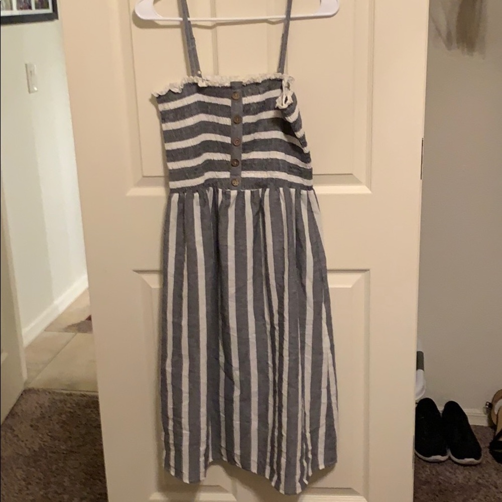 Navy and white striped sundress with smocked top